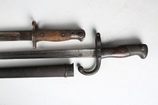 A French Gras bayonet with single-edged fullered blade, blade length 52.5cm, dated ‘1878’, hooked