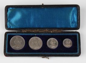 A Victoria Old Head four-coin Maundy set 1898, within a gilt-tooled leather box.Buyer’s Premium 29.