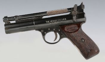 A Webley Premier .22 air pistol with composite plastic grips, together with a Webley metal target