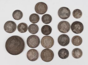 A collection of 17th, 18th and 19th century silver coinage, including a William III shilling 1697,