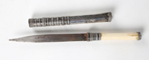 A Burmese dha with curved single-edged blade, blade length 17cm, sheet silver collar and pommel