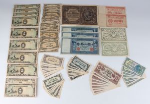 A collection of various European and world banknotes, including a group of Japanese Government