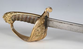 A Victorian 1827 pattern naval officer’s sword with curved pipe-back blade with quill point, blade