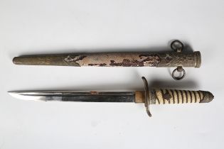 A Second World War period Japanese naval officer’s dagger with narrow straight single-edged fullered