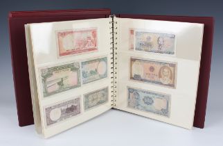 A large collection of European and world banknotes, including Peoples Republic of China,