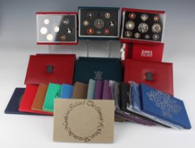 A large collection of Elizabeth II Royal Mint deluxe proof year-type coin sets.Buyer’s Premium 29.4%