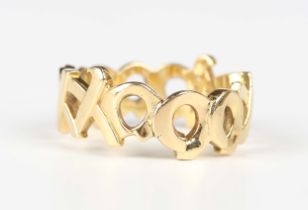 A Tiffany & Co Paloma Picasso 18ct gold ring in a pierced abstract design, detailed 'Tiffany & Co