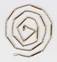 A gold necklace in a faceted baton and oval link design, on a sprung hook shaped clasp, detailed '