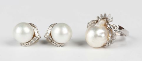 A white gold, cultured pearl and diamond dress ring, mounted with baguette and circular cut
