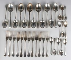 A late Victorian and later harlequin part canteen of silver Old English pattern cutlery,