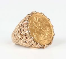 A gold ring, mounted with a George V sovereign 1913, detailed ‘9ct’, weight 16.1g, ring size