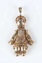 A gold and varicoloured synthetic gemstone set pendant, designed as an articulated ragdoll,