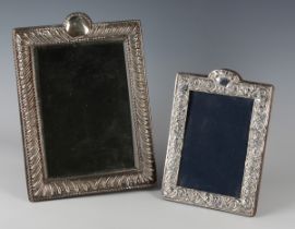 A late Victorian silver mounted rectangular dressing table mirror with reeded decoration, London