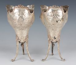 A pair of late 19th century French silver posy vases, each trilobed body engraved and embossed