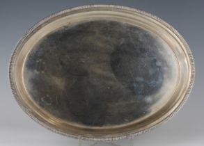 A late 19th/early 20th century Italian .800 silver oval dish with cast gadrooned rim, weight 587.5g,