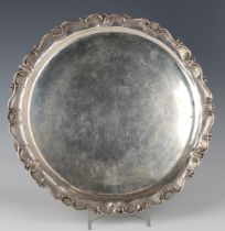 A mid-20th century Italian .800 silver circular salver with cast beaded and scroll rim, weight 683.