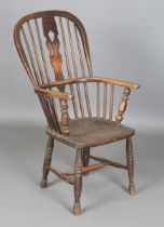 A late 19th century ash and elm Windsor armchair with a pierced splat and stick back, height