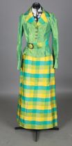 A lime green and yellow silk two-piece suit worn by Dame Vera Lynn, comprising bodice, skirt and