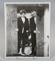 An autographed black and white photograph signed by Frank Sinatra and Jacqueline Bisset and