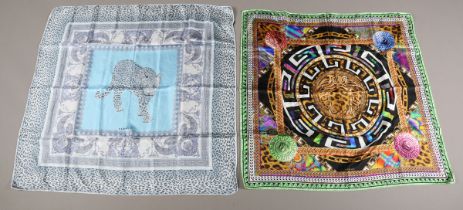 Two Versace printed silk scarves, both bearing maker's labels with CLG codes, 90cm x 90cm.Buyer’s