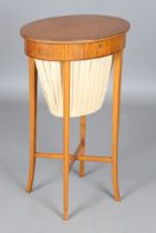 An Edwardian satinwood oval work table with line inlaid borders, height 74cm, width 45cm, depth