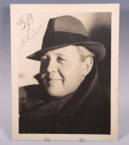 An autographed black and white oversized photograph signed by Charles Laughton and inscribed 'To