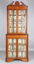 An Edwardian mahogany corner display cabinet with boxwood stringing and inlaid fan paterae, height