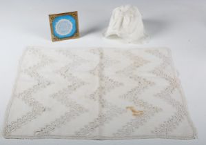 Two rare examples of 18th century hollie point lace, comprising an 18th century linen infant's cap