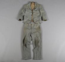 A Norman Wisdom 'Gump Suit' made by W. Snape & Son, Wolverhampton in July 1957, comprising jacket