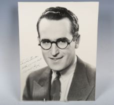 An autographed black and white oversized photograph signed by Harold Lloyd and inscribed by the