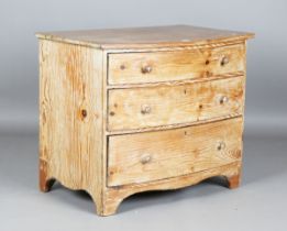 A 19th century pine bowfront chest of three graduated long drawers, height 75cm, width 90cm, depth