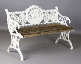 A Victorian white painted cast iron garden bench, possibly by Coalbrookdale, the back with central