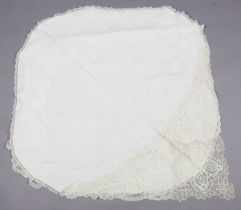 A fine early 20th century Honiton lace cream double cape with deep point de gaze medallions,