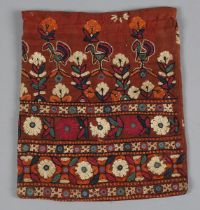 An Indian Kutch embroidered bag with mirrorwork decoration, height 40cm, width 34cm.Buyer’s