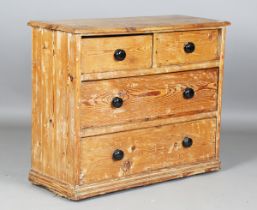 A 19th century provincial pine chest of drawers, height 81cm, width 100cm, depth 38cm.Buyer’s