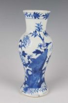 A Chinese blue and white porcelain vase, late 19th century, of slender baluster form, painted with