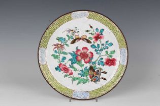 A Chinese Canton enamel famille rose saucer dish, 18th century, finely painted with butterflies