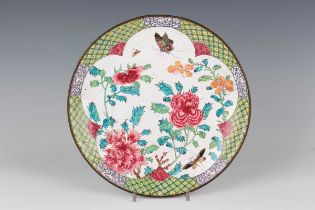 A Chinese Canton enamel famille rose saucer dish, 18th century, finely painted with two