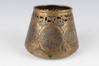 A Cairo ware small brass jardinière pot, late 19th/early 20th century, overlaid in copper and silver