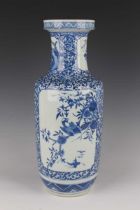 A Chinese blue and white porcelain rouleau vase, Kangxi style but late Qing dynasty, the body