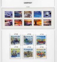 Channel Islands stamp collection in eighteen albums with Guernsey and Alderney to 2013 mint,