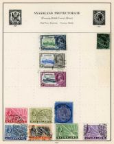World stamps in two Strand albums with British Commonwealth, China stock book, first day covers in