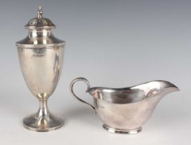 A George VI silver sauceboat with scroll handle, Sheffield 1946 by Atkin Brothers, length 17.5cm,