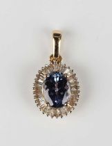 A 14ct gold, diamond and tanzanite oval pendant, claw set with the oval cut tanzanite within a