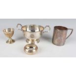 A late Victorian silver cylindrical christening tankard with engraved decoration and angular handle,