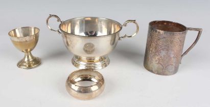 A late Victorian silver cylindrical christening tankard with engraved decoration and angular handle,