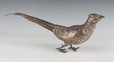 An early 20th century German silver model of a pheasant with detachable head and finely engraved