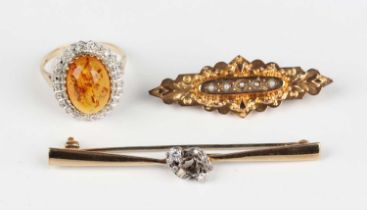 A gold, treated amber and diamond oval cluster ring, detailed ‘9K DIA’, ring size approx Q, a 9ct