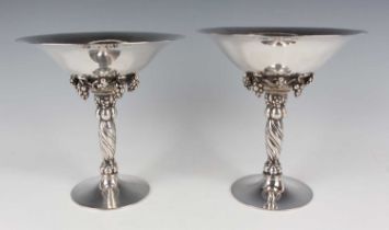A near pair of Georg Jensen silver Grape pattern tazze, designed by Georg Jensen, numbered '263' and