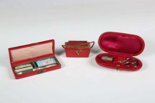 A Regency red Morocco leather needle casket, the hinged lid gilt-tooled 'Royal Improved', width 5.